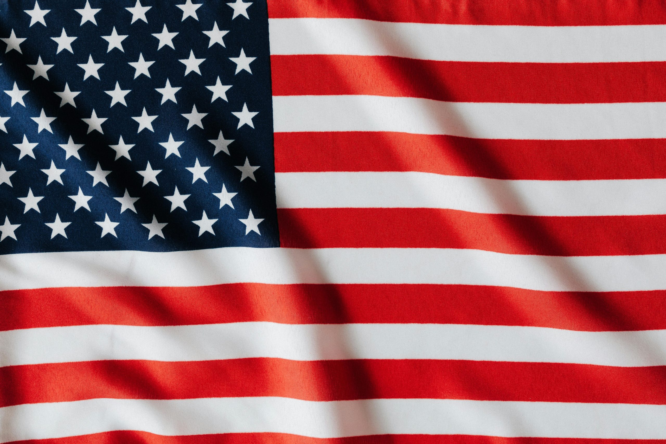 pexels-photo-4386429-4386429 Detailed close-up of the American flag showcasing vibrant colors and texture.